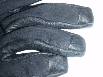 Leather extending over the finger tips